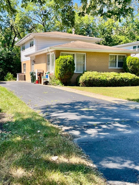 Photo of 18120 Rockwell Avenue, Homewood, IL 60430 (MLS # 12753119)