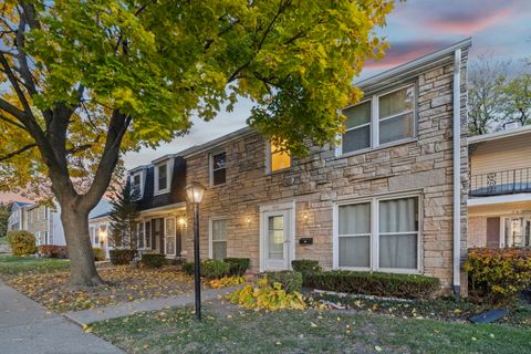 Photo of 7605 Manchester Manor Mnr, Hanover Park, IL 60133 (MLS # 12517663)