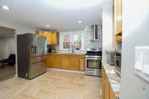 Tiny photo for 2413 20th Street, North Chicago, IL 60064 (MLS # 12436288)
