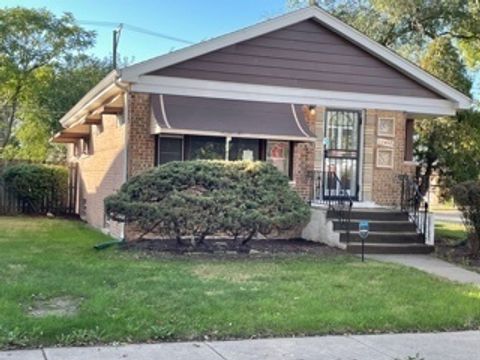 Photo of 12400 S Lowe Avenue, Chicago, IL 60628 (MLS # 12298651)