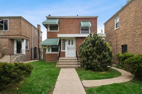 Photo of 8906 S Crandon Avenue, Chicago, IL 60617 (MLS # 12681968)