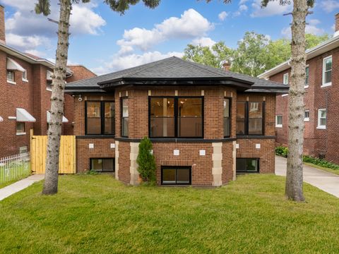 Photo of 7427 S Oglesby Avenue, Chicago, IL 60649 (MLS # 12490702)