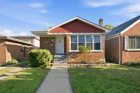 Photo of 657 E 100th Place, Chicago, IL 60628 (MLS # 12710586)