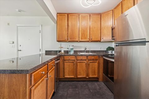 Tiny photo for 5817 Oakwood Drive #E, Lisle, IL 60532 (MLS # 12616291)