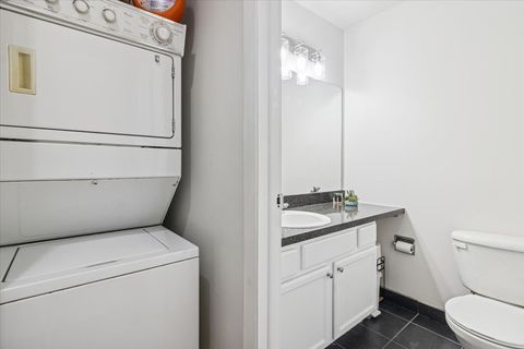 Tiny photo for 5817 Oakwood Drive #E, Lisle, IL 60532 (MLS # 12616291)