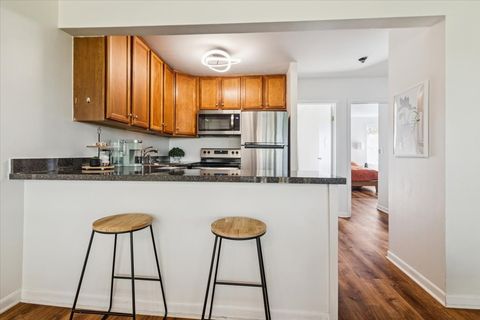 Tiny photo for 5817 Oakwood Drive #E, Lisle, IL 60532 (MLS # 12616291)