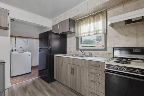 Tiny photo for 11013 Menard Avenue, Chicago Ridge, IL 60415 (MLS # 12482885)