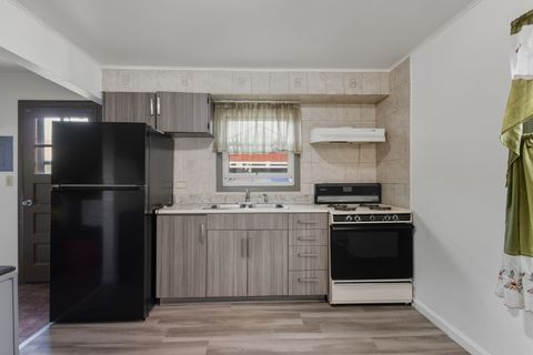 Tiny photo for 11013 Menard Avenue, Chicago Ridge, IL 60415 (MLS # 12482885)