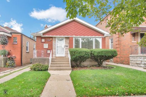 Photo of 10348 S Rhodes Avenue, Chicago, IL 60628 (MLS # 12448418)