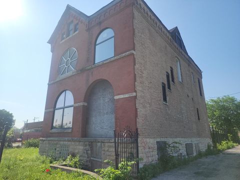 Photo of 311 W Garfield Boulevard, Chicago, IL 60621 (MLS # 12404060)