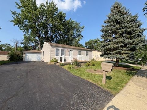 Photo of 110 Cedar Circle, Streamwood, IL 60107 (MLS # 12485273)