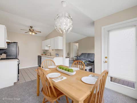 Tiny photo for 1104 Canterbury Court #D, Elgin, IL 60120 (MLS # 12671252)