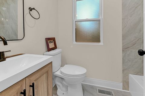 Tiny photo for 703 W 129th Place, Chicago, IL 60628 (MLS # 12502114)