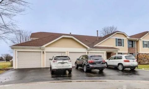 Photo of 1022 Boxwood Court #A1, Wheeling, IL 60090 (MLS # 12636206)