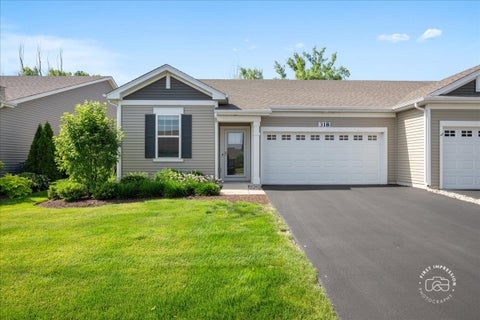 Photo of 318 Sussex Lane, North Aurora, IL 60542 (MLS # 12690353)
