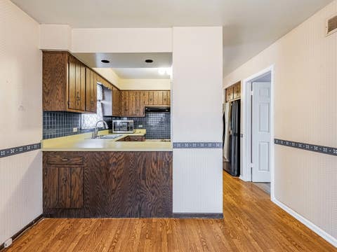 Tiny photo for 18136 Oakwood Avenue, Lansing, IL 60438 (MLS # 12725225)