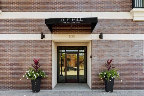 Photo of 105 S Cottage Hill Avenue #304, Elmhurst, IL 60126 (MLS # 12485208)