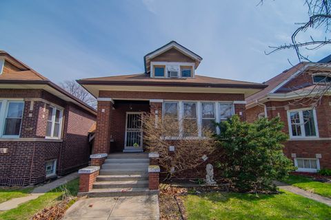 Photo of 7741 S CHAPPEL Avenue, Chicago, IL 60649 (MLS # 12597717)