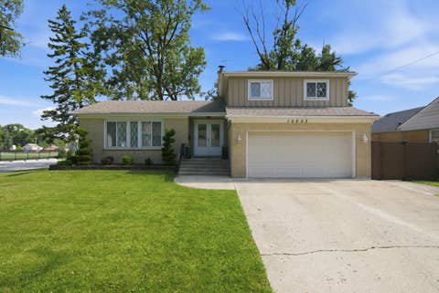 Photo of 10603 Drummond Place, Melrose Park, IL 60164 (MLS # 12697818)