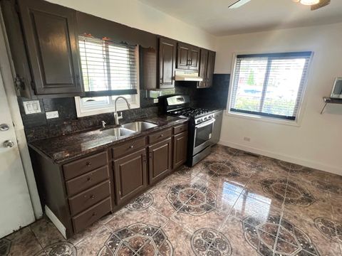 Tiny photo for 6031 S Merrimac Avenue, Chicago, IL 60638 (MLS # 12632406)