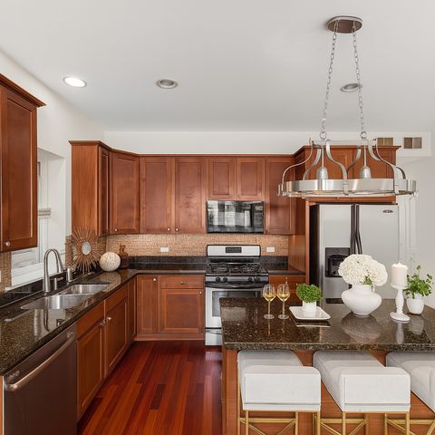 Tiny photo for 7443 W Irving Park Road #4E, Chicago, IL 60634 (MLS # 12487100)