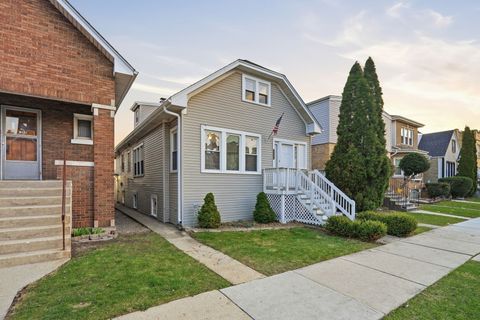 Photo of 5135 W Melrose Street, Chicago, IL 60641 (MLS # 12628746)