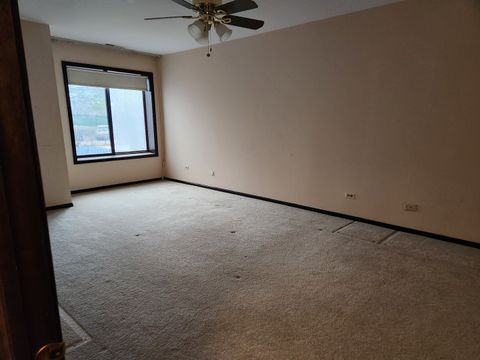 Tiny photo for 9242 Gross Point Road #107, Skokie, IL 60077 (MLS # 12592309)