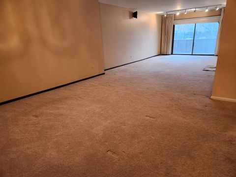 Tiny photo for 9242 Gross Point Road #107, Skokie, IL 60077 (MLS # 12592309)