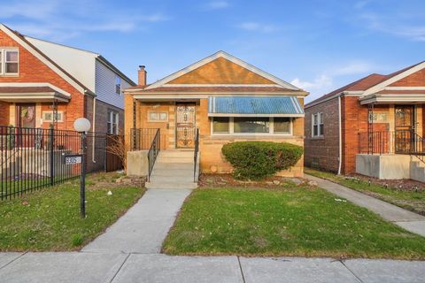 Photo of 8305 S Paxton Avenue, Chicago, IL 60617 (MLS # 12610462)
