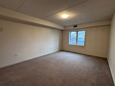 Tiny photo for 9864 Leland Avenue #214, Schiller Park, IL 60176 (MLS # 12622769)