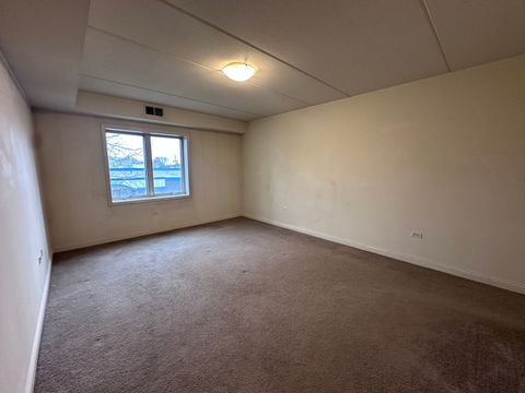 Tiny photo for 9864 Leland Avenue #214, Schiller Park, IL 60176 (MLS # 12622769)