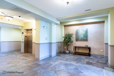 Tiny photo for 9864 Leland Avenue #214, Schiller Park, IL 60176 (MLS # 12622769)
