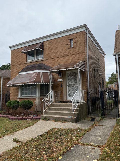 Photo of 10418 S Calumet Avenue, Chicago, IL 60628 (MLS # 12493699)