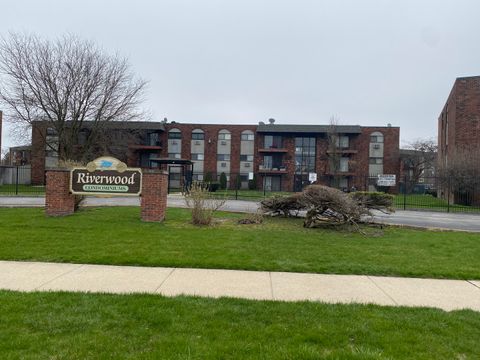 Photo of 13711 S Stewart Avenue #A1E, Riverdale, IL 60827 (MLS # 12326453)