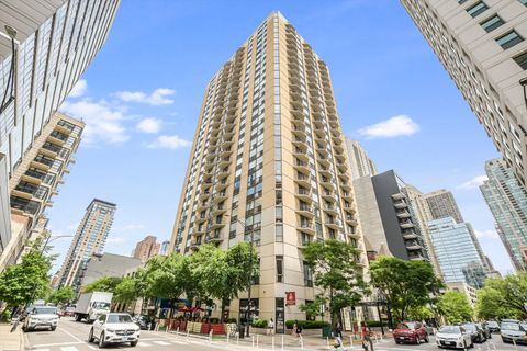 Photo of 70 W Huron Street #406, Chicago, IL 60654 (MLS # 12406002)