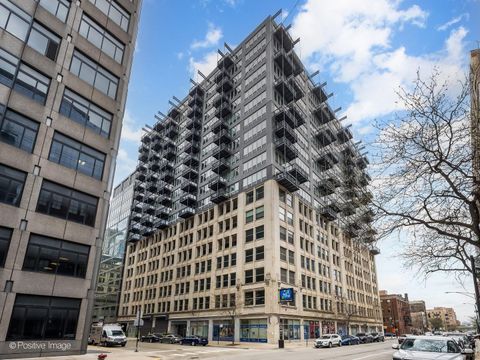 Photo of 565 W Quincy Street #704, Chicago, IL 60661 (MLS # 12598782)