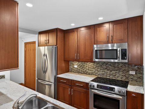 Tiny photo for 907 Curtiss Street #504, Downers Grove, IL 60515 (MLS # 12544009)