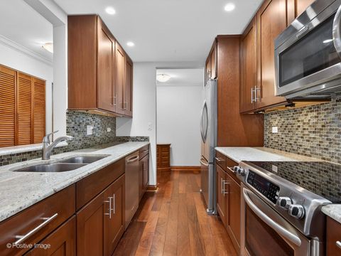 Tiny photo for 907 Curtiss Street #504, Downers Grove, IL 60515 (MLS # 12544009)