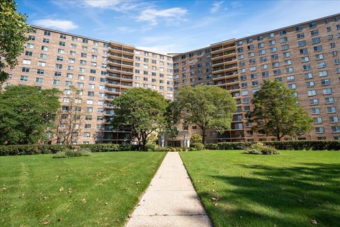 Photo of 7141 N Kedzie Avenue #406, Chicago, IL 60645 (MLS # 12461950)