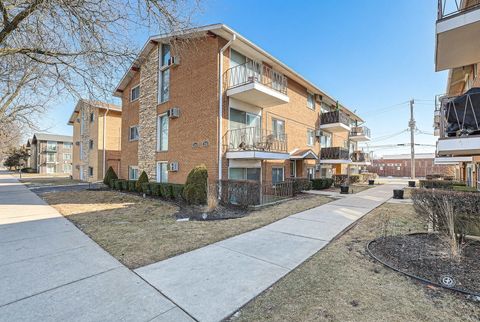 Photo of 6111 W 64th Place #2, Chicago, IL 60638 (MLS # 12564399)