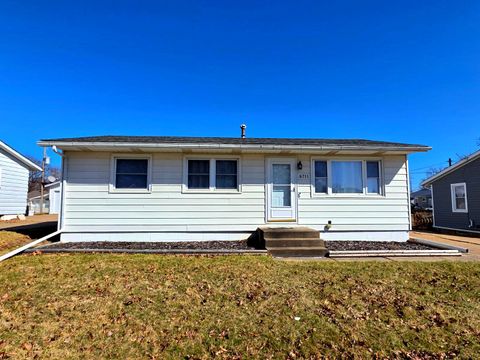 Photo of 6711 Ridge Drive, Davenport, IA 52806 (MLS # 12590868)