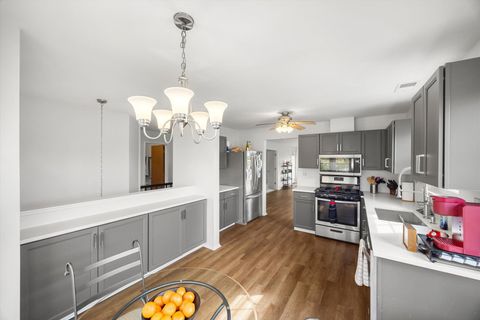 Tiny photo for 1968 Quaker Hollow Lane, Streamwood, IL 60107 (MLS # 12496877)