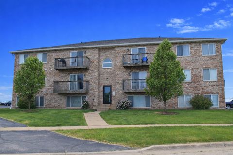 Photo of 565 N Strack Street #302, Cortland, IL 60112 (MLS # 12650882)