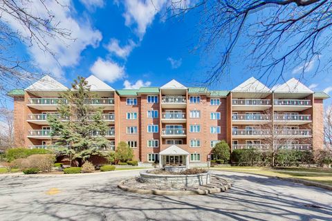 Photo of 6980 W Touhy Avenue #402, Niles, IL 60714 (MLS # 12601440)