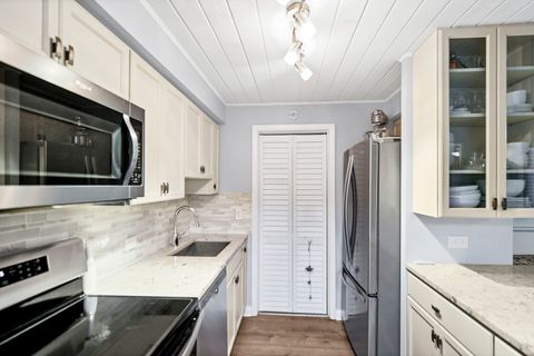 Tiny photo for 7754 W Higgins Road #J, Chicago, IL 60631 (MLS # 12433954)