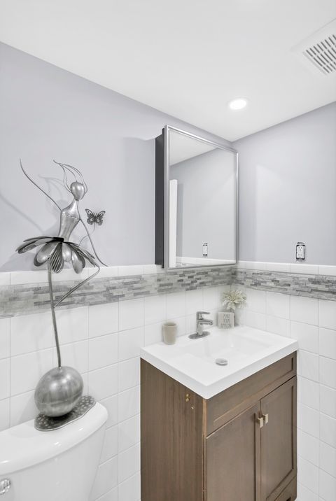 Tiny photo for 7754 W Higgins Road #J, Chicago, IL 60631 (MLS # 12433954)