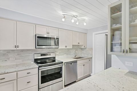 Tiny photo for 7754 W Higgins Road #J, Chicago, IL 60631 (MLS # 12433954)