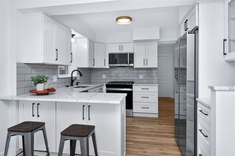 Tiny photo for 7624 W Ainslie Street, Harwood Heights, IL 60706 (MLS # 12545442)