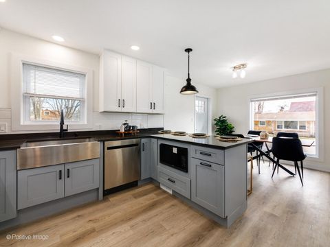 Tiny photo for 1701 N Sayre Avenue, Chicago, IL 60707 (MLS # 12635658)