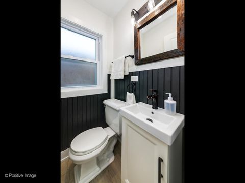 Tiny photo for 1701 N Sayre Avenue, Chicago, IL 60707 (MLS # 12635658)